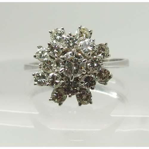 733 - An 18ct gold diamond cluster ring