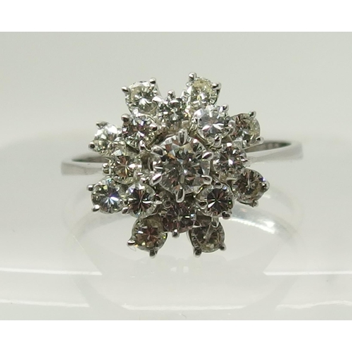 733 - An 18ct gold diamond cluster ring