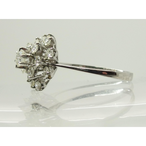 733 - An 18ct gold diamond cluster ring