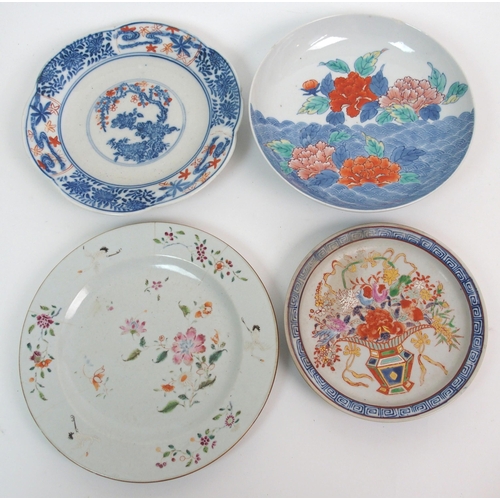 75 - A quantity of Chinese plates and saucers