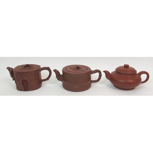 82 - Eight Yixing teapots