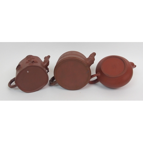 82 - Eight Yixing teapots