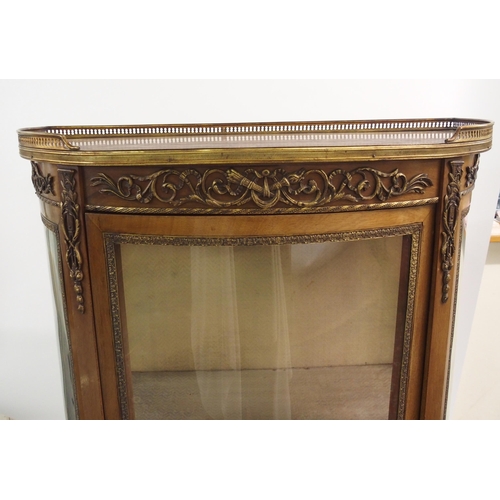 858 - A Louis XVI style mahogany bowfront display cabinet