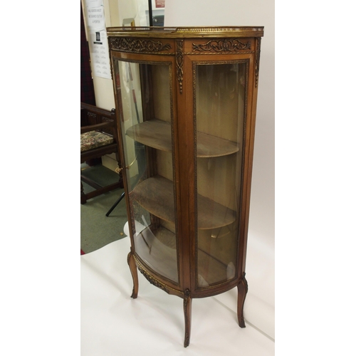 858 - A Louis XVI style mahogany bowfront display cabinet