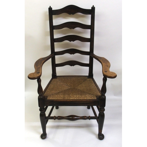 860 - A set of fourteen early 20th Century ash ladderback dining chairs