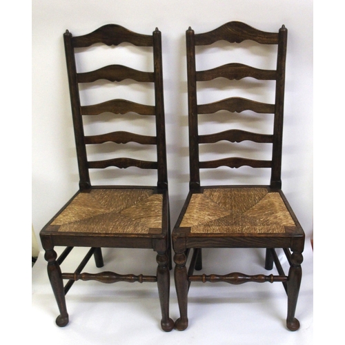 860 - A set of fourteen early 20th Century ash ladderback dining chairs