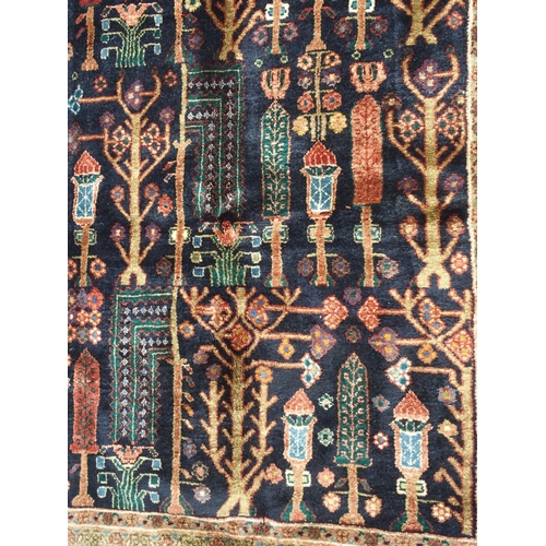 885 - A blue ground Hamadan rug