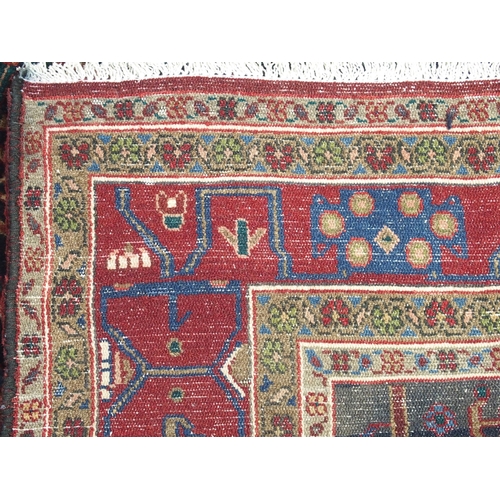 885 - A blue ground Hamadan rug