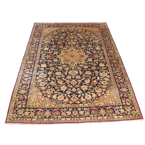 886 - A blue ground Najaf Abad rug