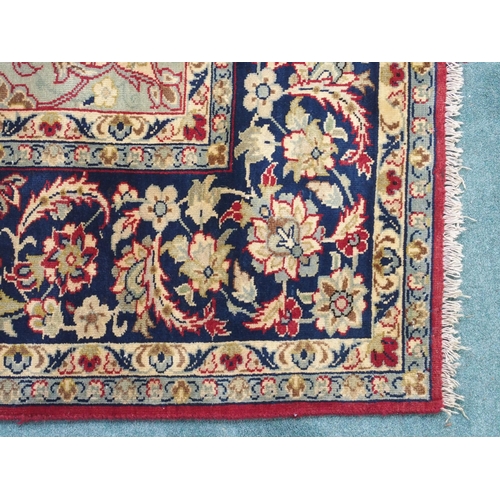 886 - A blue ground Najaf Abad rug