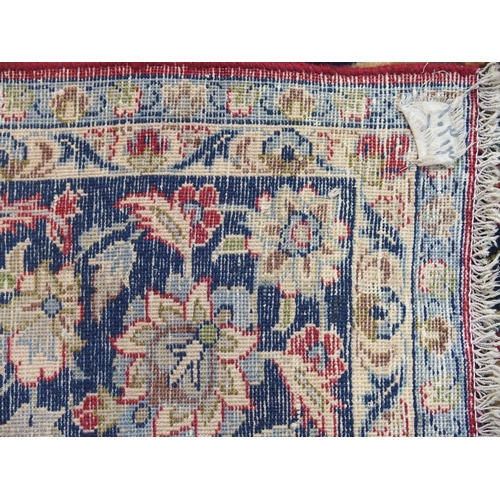 886 - A blue ground Najaf Abad rug