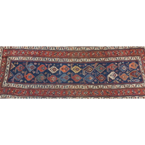 889 - A blue ground Eastern rug