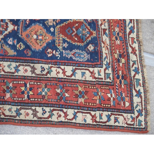 889 - A blue ground Eastern rug