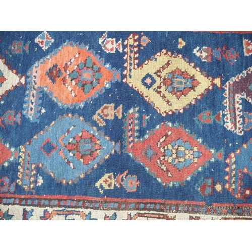 889 - A blue ground Eastern rug