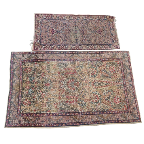 890 - A Kirman rug