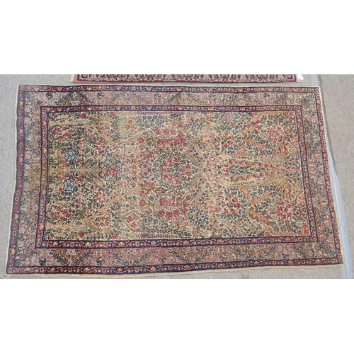 890 - A Kirman rug