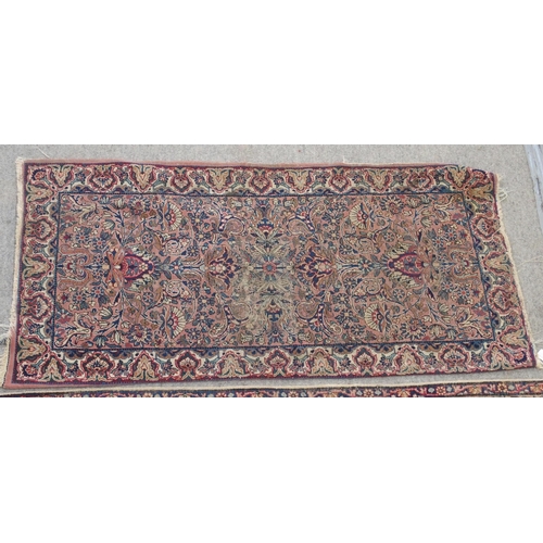 890 - A Kirman rug