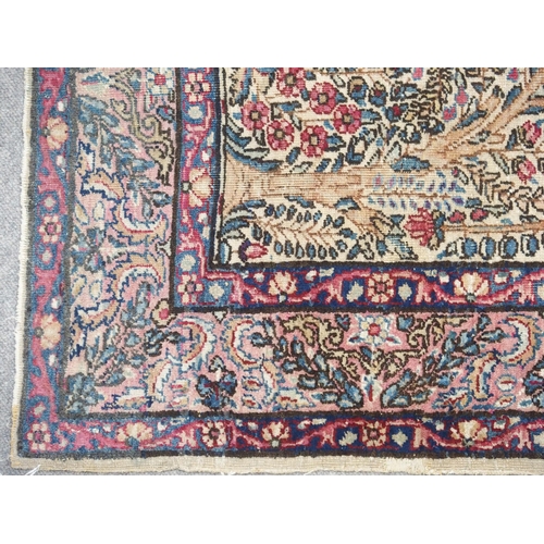 890 - A Kirman rug