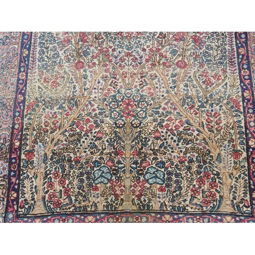 890 - A Kirman rug