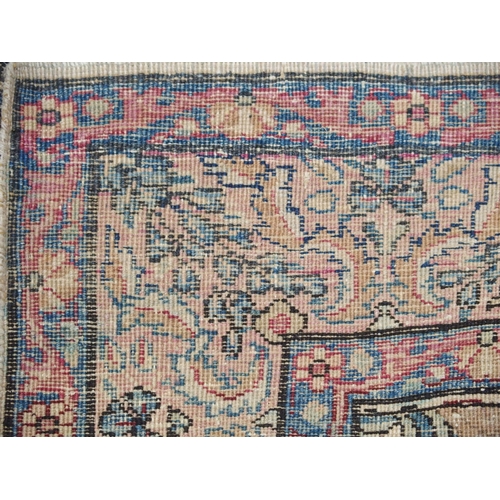 890 - A Kirman rug