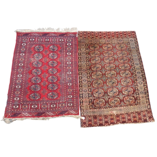 891 - A red ground Bokhara rug