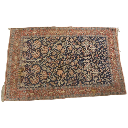 892 - A blue ground tree of life rug