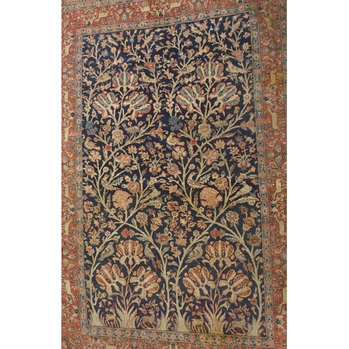 892 - A blue ground tree of life rug