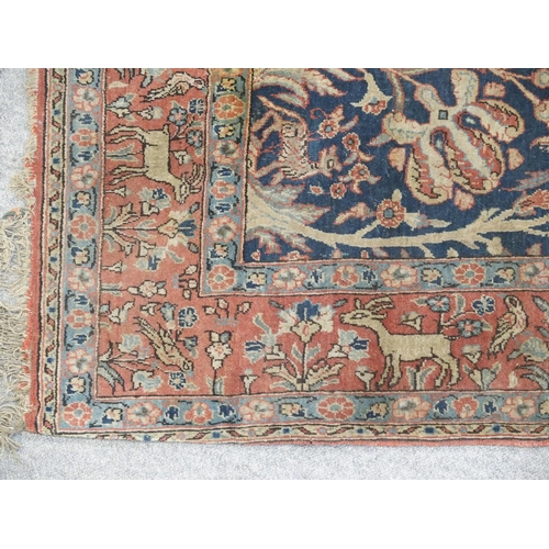 892 - A blue ground tree of life rug