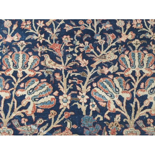 892 - A blue ground tree of life rug