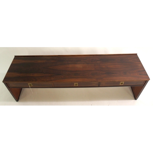 895 - A rosewood low table by Bruksbo of Norway