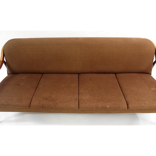 906 - A 1970's Greaves and Thomas teak framed upholstered sofa bed