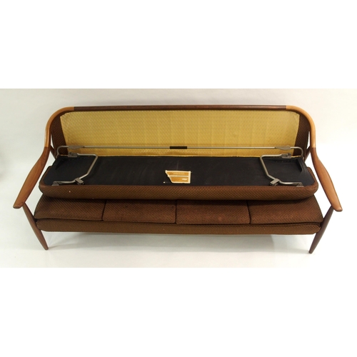 906 - A 1970's Greaves and Thomas teak framed upholstered sofa bed