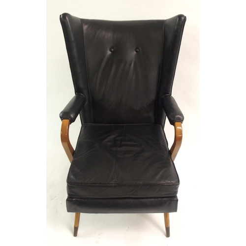 910 - A Furpro Furniture 1960's black leather wingback chair