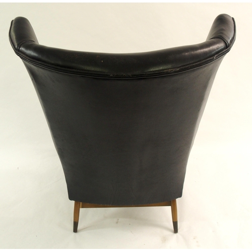 910 - A Furpro Furniture 1960's black leather wingback chair