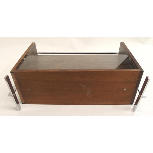 914 - A Richard Young  Merrow Associated rosewood veneered and chrome magazine rack