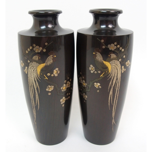 136 - A pair of Japanese bronze vases