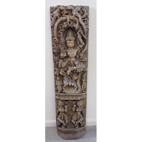 139 - A large Burmese carved hardwood panel