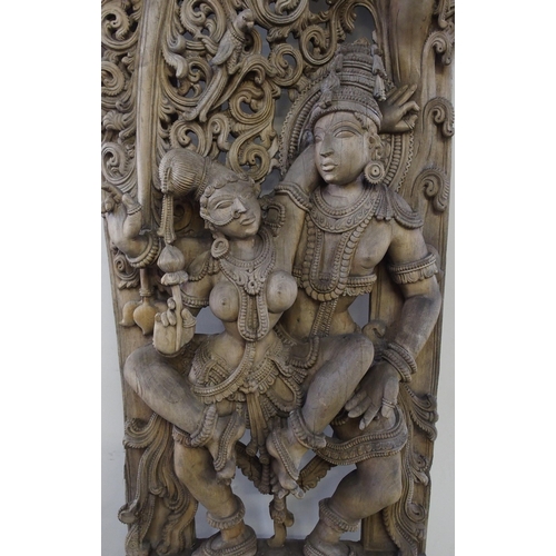 139 - A large Burmese carved hardwood panel