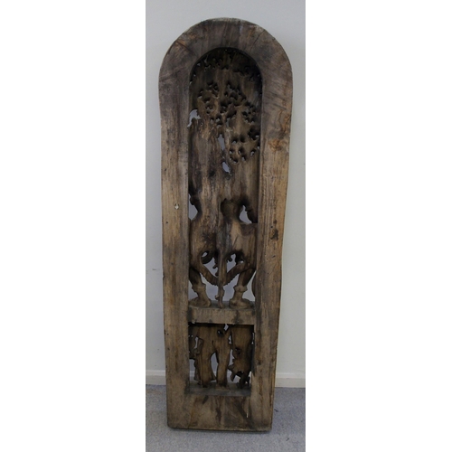 139 - A large Burmese carved hardwood panel