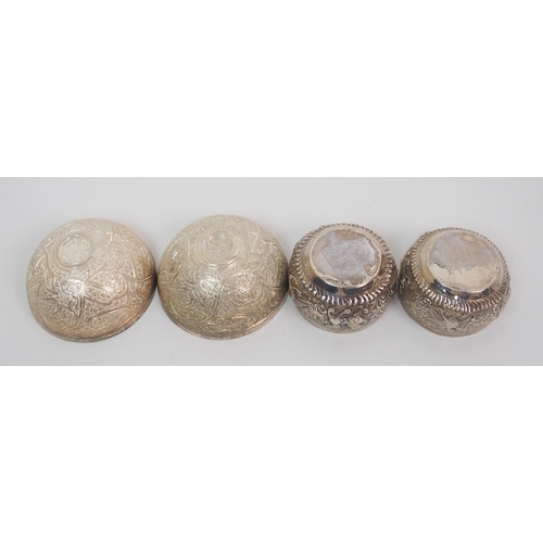 14 - Nine Eastern white metal bowls