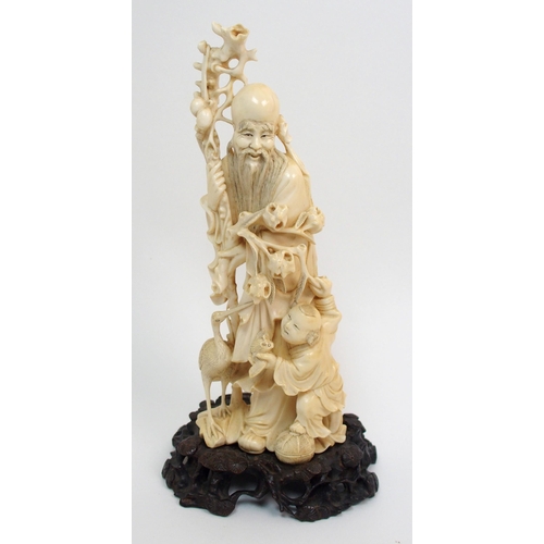 141 - A Chinese carved ivory figure of Shou Lao