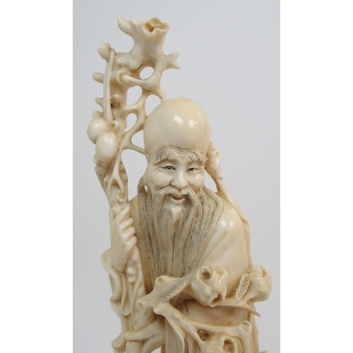 141 - A Chinese carved ivory figure of Shou Lao