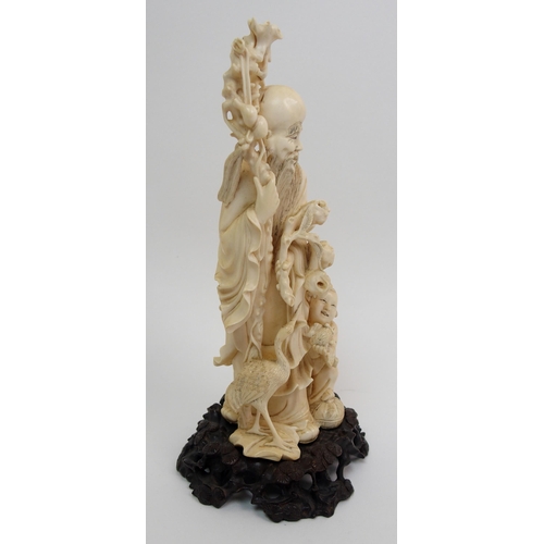 141 - A Chinese carved ivory figure of Shou Lao