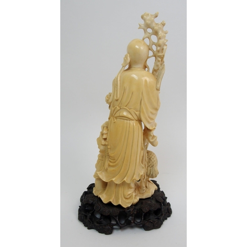 141 - A Chinese carved ivory figure of Shou Lao