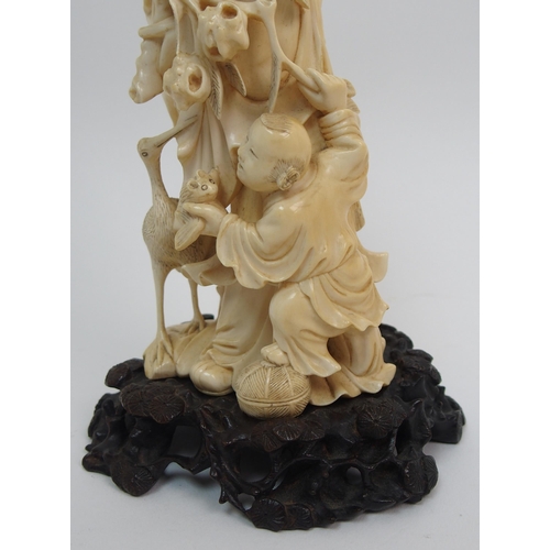 141 - A Chinese carved ivory figure of Shou Lao