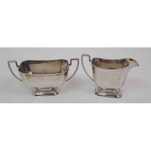 160 - An Art Deco silver three piece tea service