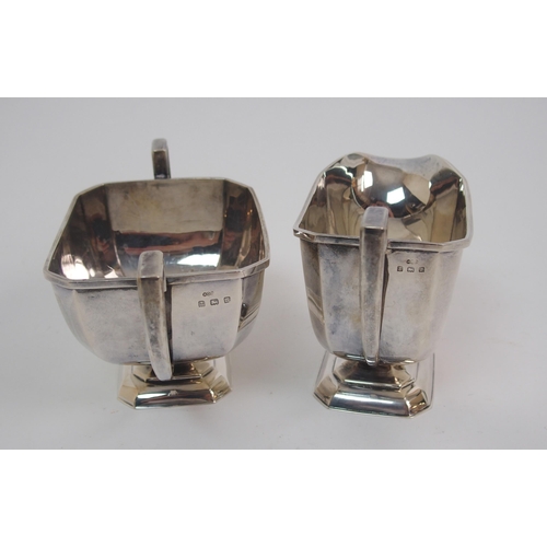 160 - An Art Deco silver three piece tea service