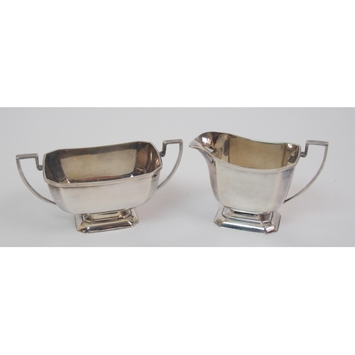 160 - An Art Deco silver three piece tea service