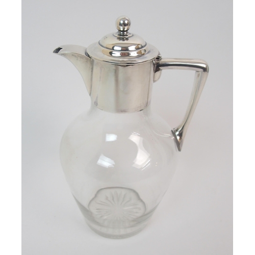 161 - A late Victorian silver-topped claret jug