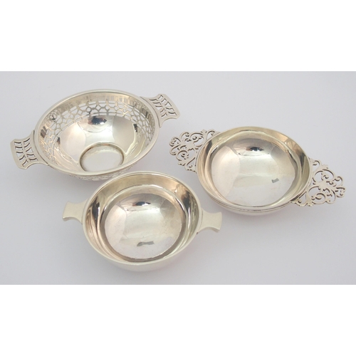 169 - A silver quaich with pierced handles